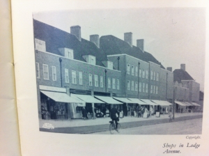 A photograph capturing the shops on Lodge Avenue from the 1930's
